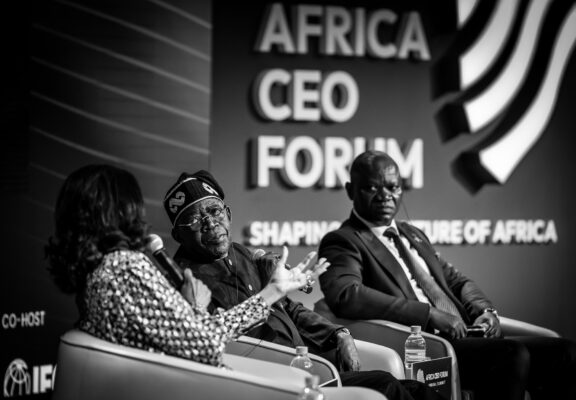 Nigerian workers in factories and offices symbolising new jobs